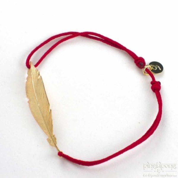 Bracelet L'AVARE bijoux en forme de plume en argent plaqué or et fil de coton rouge