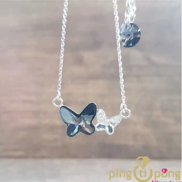 Animal jewellery: Grey butterfly necklace in silver and rhodium plated with Swarovski crystals from SPARK