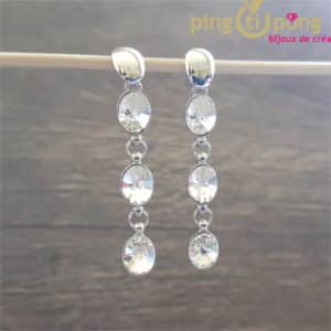 Swarovski Jewellery: White waterfall earrings in rhodium-plated silver and Swarovski diamond crystals by SPARK