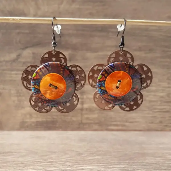 Bijoux fantaisie : Fleur bouton orange de Pingtipong